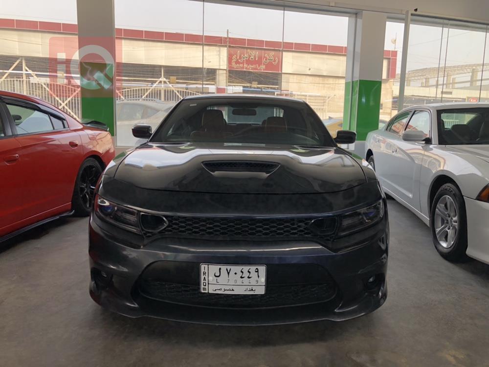 دۆج چارجەر